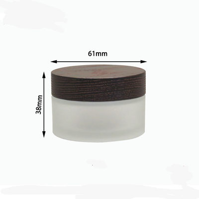 καλλυντικό βάζο γυαλιού ώμων 15g 30g 50g πλάγιο με την καφετιά ξύλινη κρέμα καπακιών