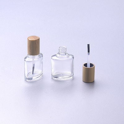 το κενό μπουκάλι 15ml στιλβωτικής ουσίας γυαλιού καρφιών με το μπαμπού ξύλινη ΚΑΠ βουρτσών αποτελεί