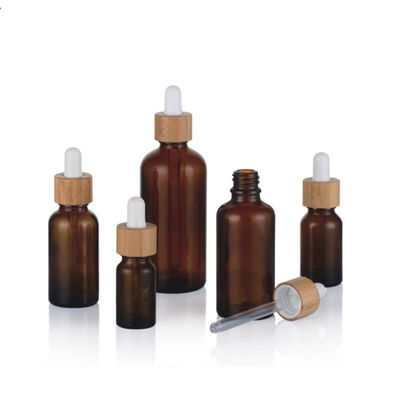 1oz κενά ηλέκτρινα μαύρα Dropper γυαλιού ουσιαστικού πετρελαίου μπουκάλια με τα καπάκια μπαμπού