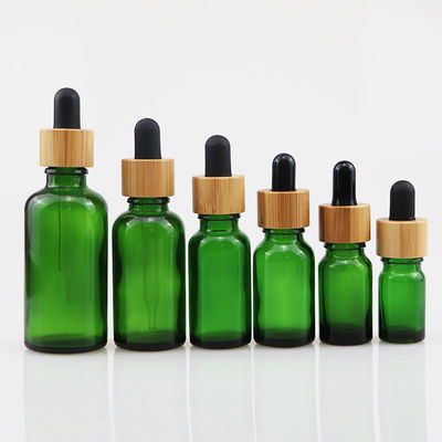 100ml καλλυντικό μπουκάλι γυαλιού ουσιαστικού πετρελαίου με dropper μπαμπού το δέρμα προσοχής καφετί