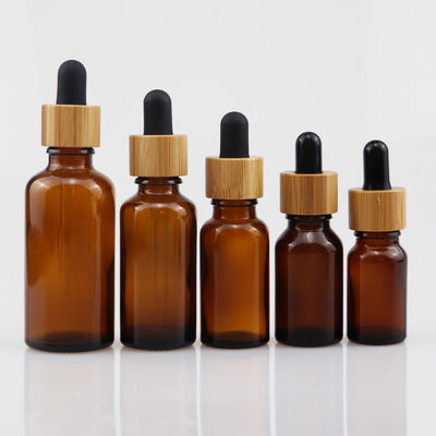 100ml καλλυντικό μπουκάλι γυαλιού ουσιαστικού πετρελαίου με dropper μπαμπού το δέρμα προσοχής καφετί